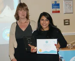Ravneet Bermi receiving her Franchisee of the Year Award 2018