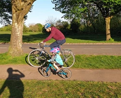 Two-year-old Daisy cycling 45 km for baby sister Lily