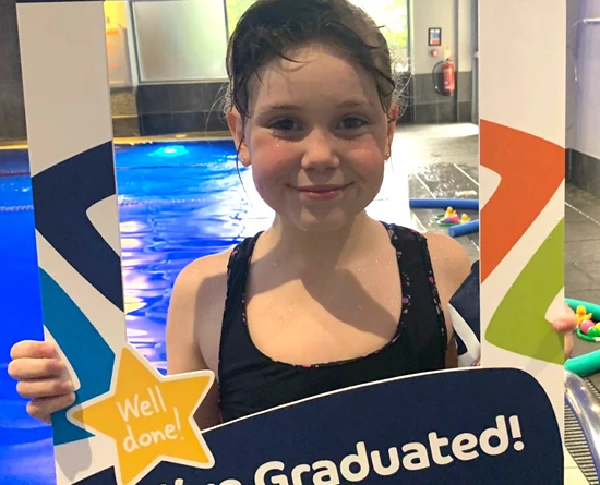 Cadbury pool's elite swimmer Daisy graduates from level 6